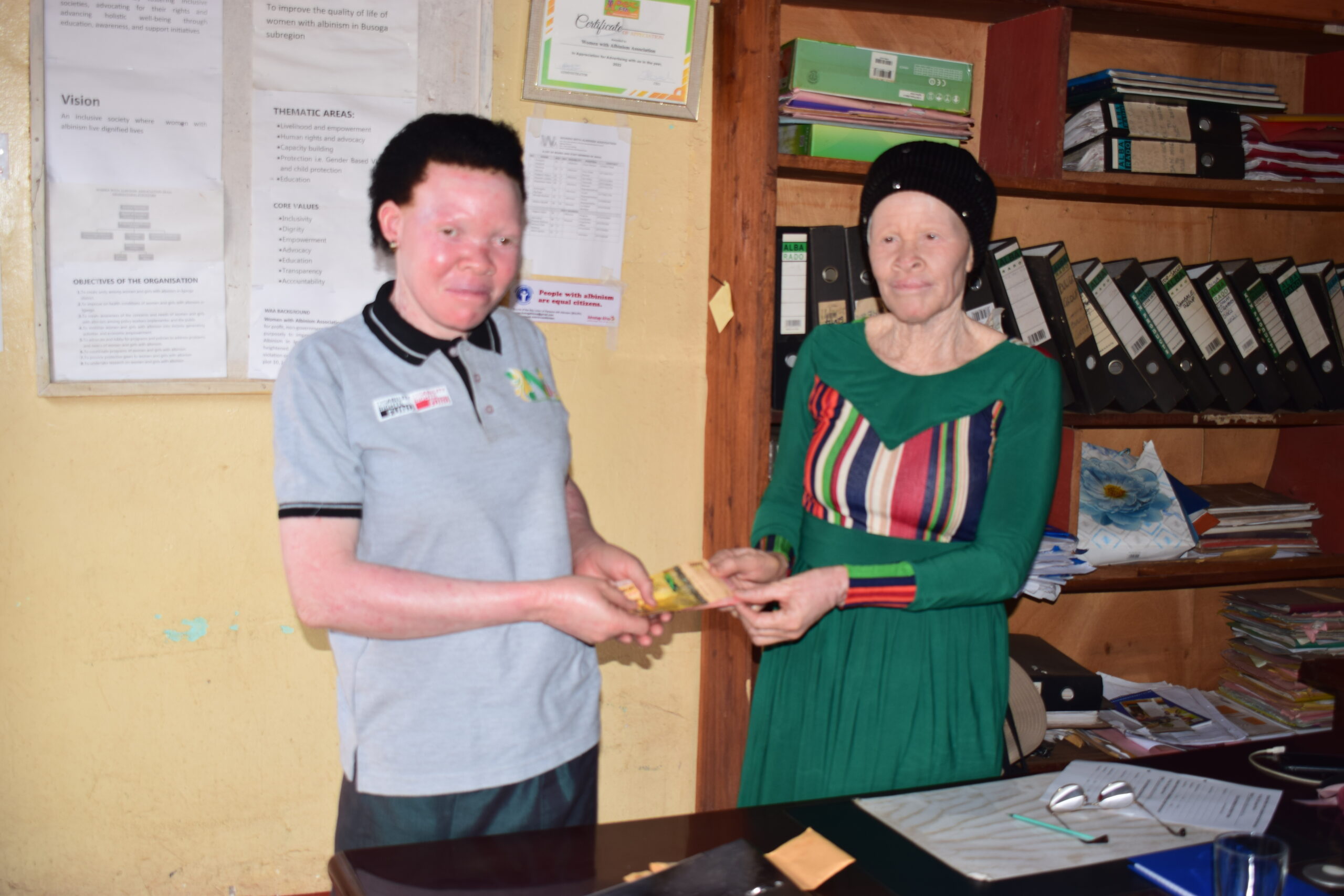 Women with albinism in leadership roles at WAA office